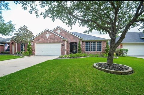 Photo of 210 Riverway Bluff Lane, Richmond, TX 77406 (MLS # 42652577)