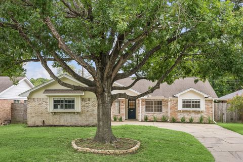 Photo of 9418 Meadowbriar Lane, Houston, TX 77063 (MLS # 92862865)