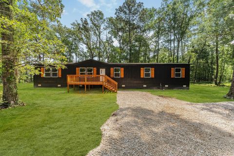 Photo of 16465 Hickory Road, Conroe, TX 77302 (MLS # 26335344)