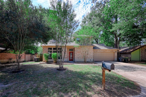 Photo of 1909 Tickner Street, Conroe, TX 77301 (MLS # 82981075)