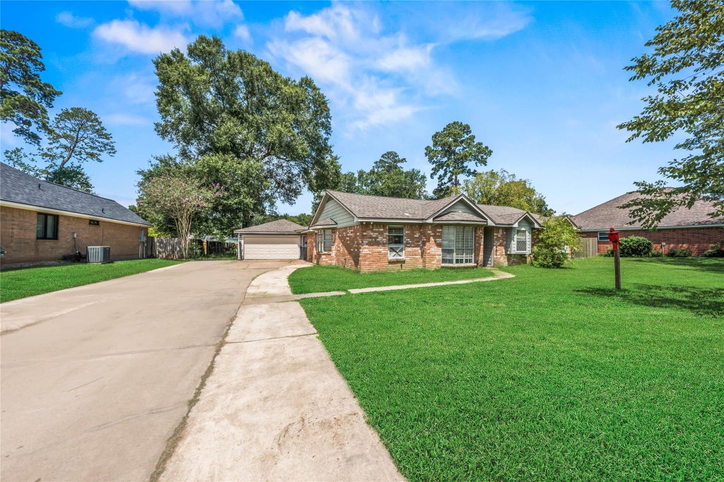 Photo of 507 Magnolia Bend, Roman Forest, TX 77357 (MLS # 23632935)