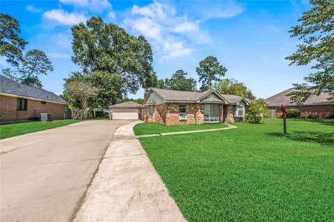 Photo of 507 Magnolia Bend, Roman Forest, TX 77357 (MLS # 23632935)