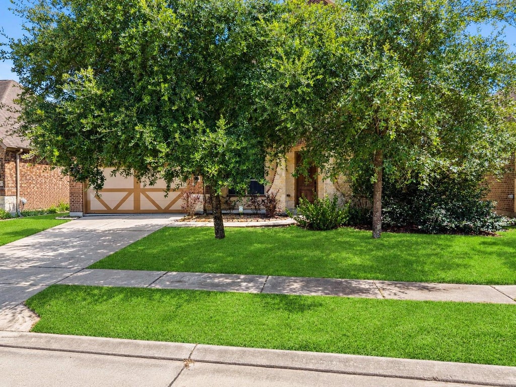 Photo of 26111 Tintagel Lane, Kingwood, TX 77339 (MLS # 56683797)