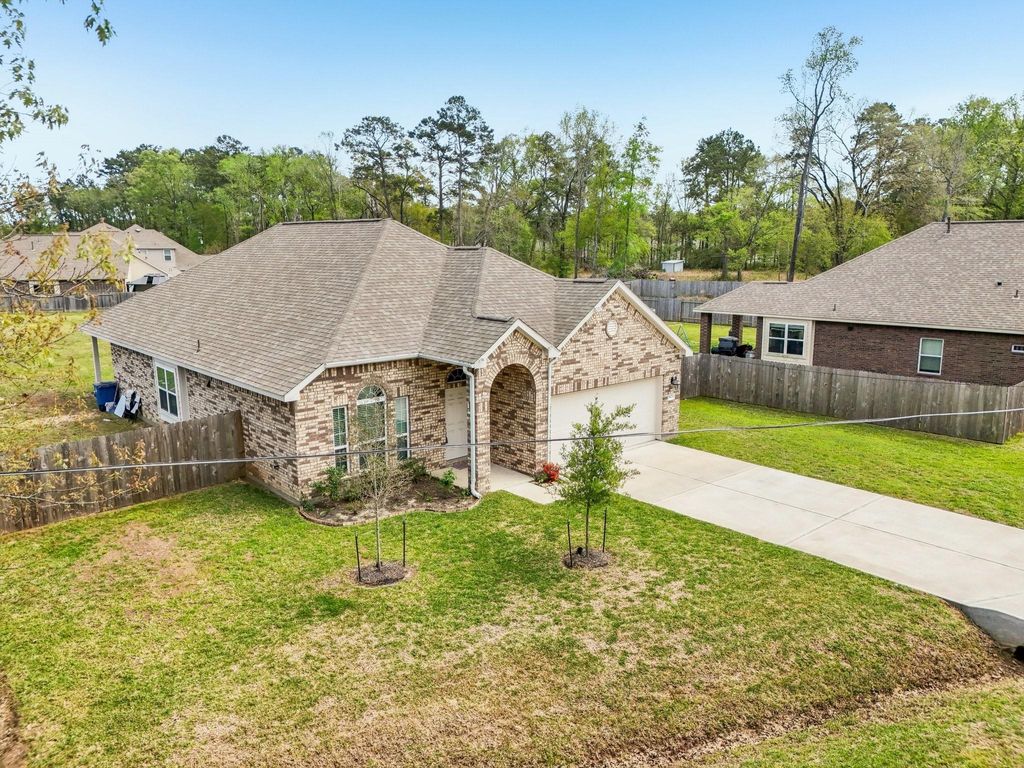 Photo of 18473 Railroad Avenue, New Caney, TX 77357 (MLS # 36610184)
