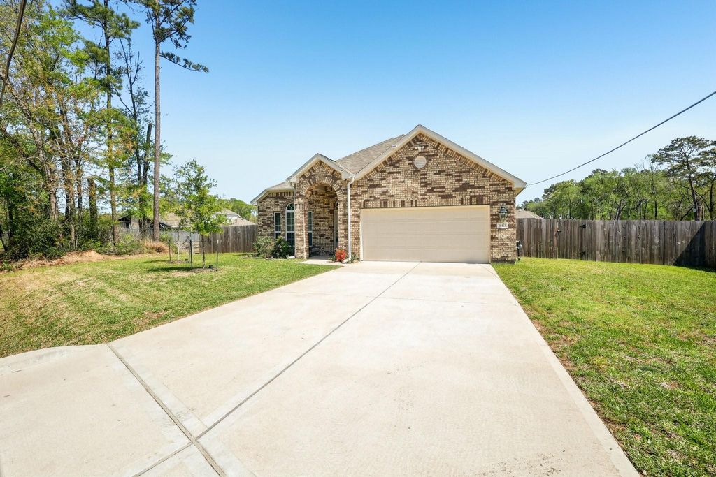 Photo of 18473 Railroad Avenue, New Caney, TX 77357 (MLS # 36610184)