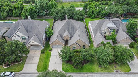 Photo of 23 Langstone Place, Spring, TX 77389 (MLS # 69134360)
