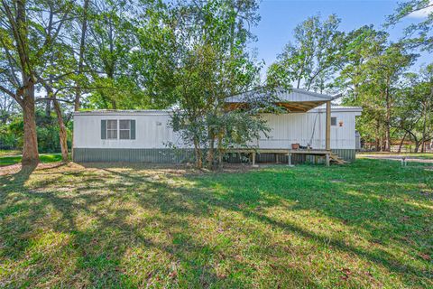 Photo of 14 County Road 2400, Hull, TX 77564 (MLS # 40399257)