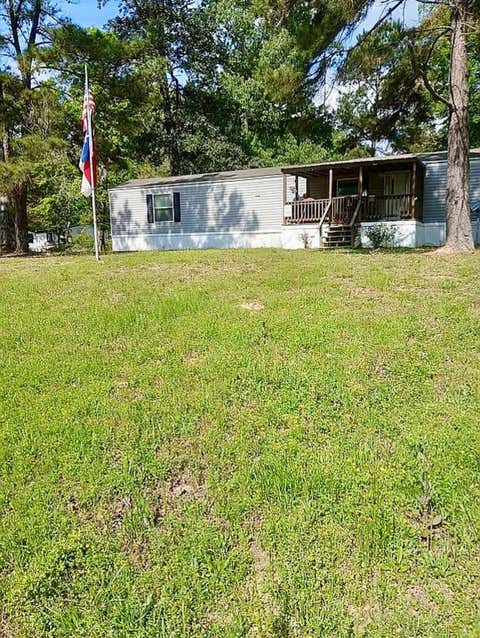 Photo of 883 County Road 3737, Splendora, TX 77372 (MLS # 89218979)