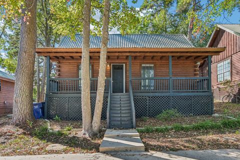 Photo of 55 Hunters Creek Drive, Huntsville, TX 77340 (MLS # 49897486)