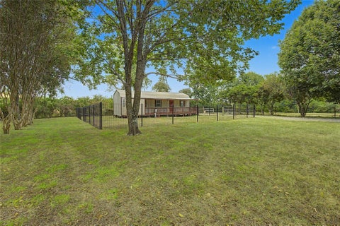 Photo of 12039 Anderson Road, Willis, TX 77318 (MLS # 61419914)