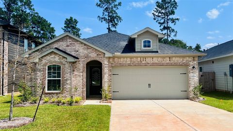 Photo of 10604 Altitude Way, Conroe, TX 77303 (MLS # 86101935)