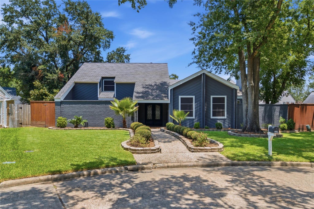 Photo of 703 Queensmill Court, Houston, TX 77079 (MLS # 12060223)