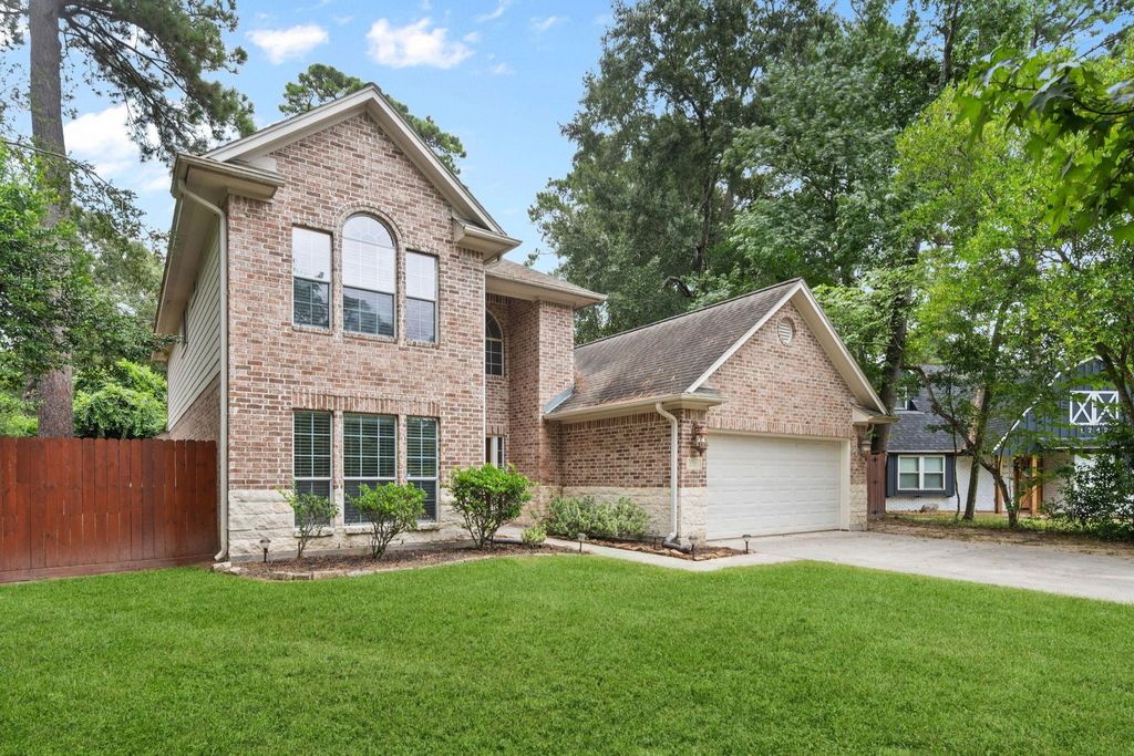 Photo of 1743 Hill Top Lane, Kingwood, TX 77339 (MLS # 97340150)