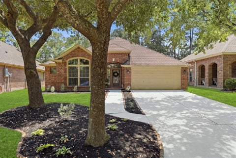 Photo of 22117 Iron Knoll Drive, Kingwood, TX 77339 (MLS # 97800249)