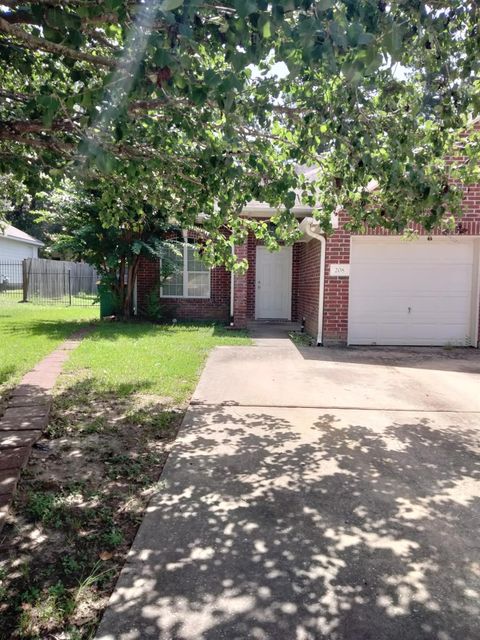 Photo of 208 Canterbury Drive, Conroe, TX 77303 (MLS # 13879961)