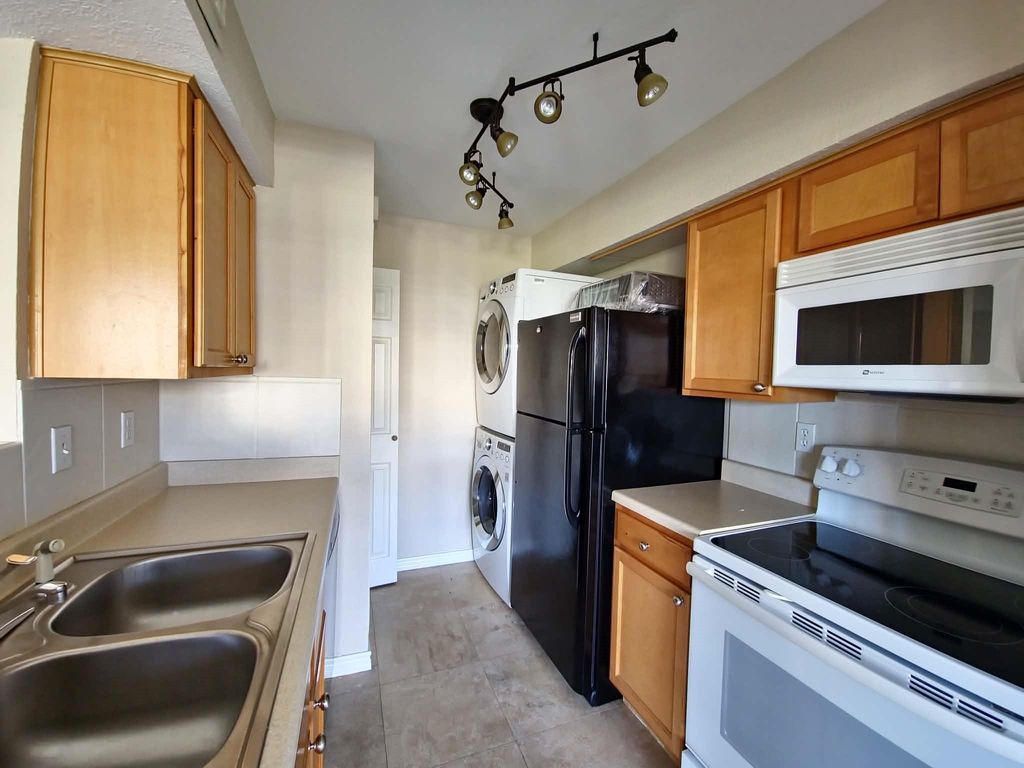 Photo of 4011 Nasa Rd 1 #406, El Lago, TX 77586 (MLS # 78186157)