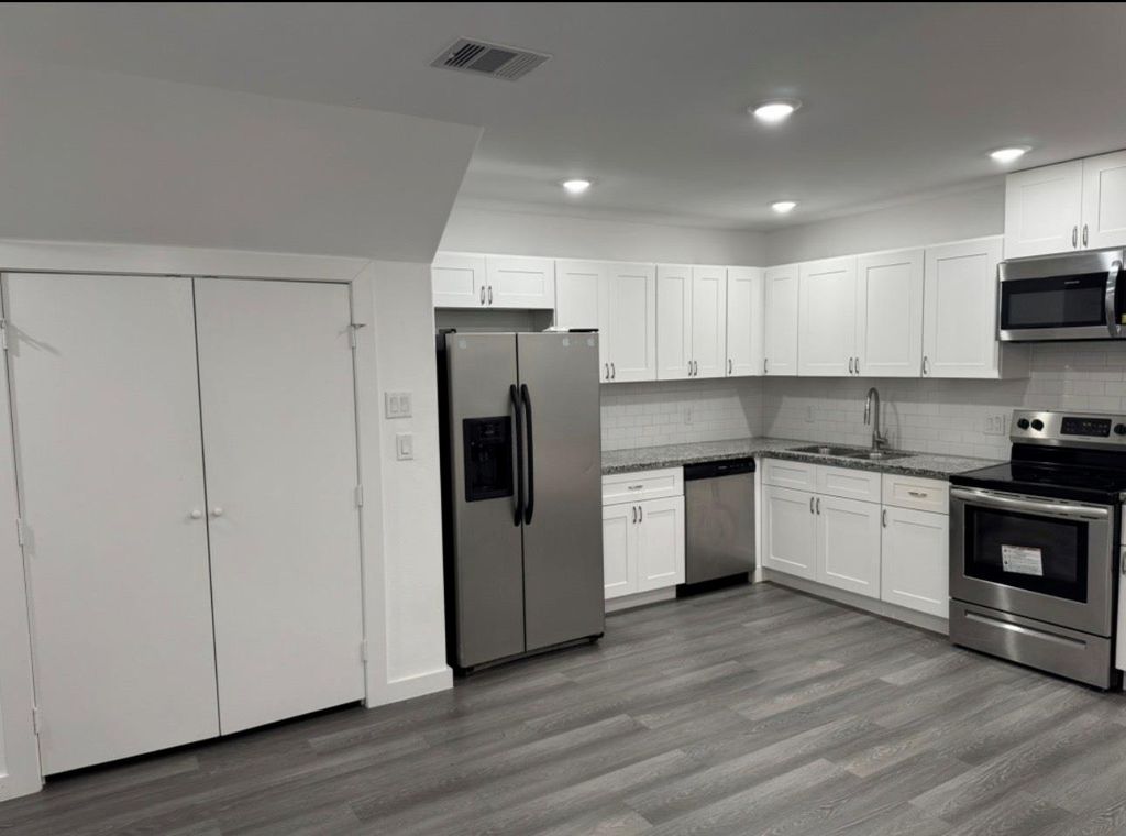 Photo of 9403 Madera Road #A, Houston, TX 77078 (MLS # 50605919)