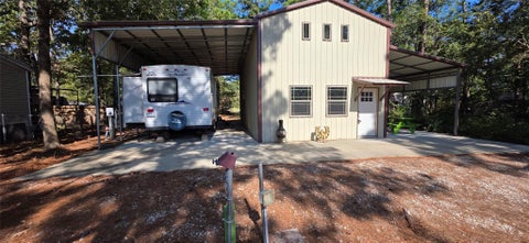 Photo of 50 Nassau Lane, Point Blank, TX 77364 (MLS # 93412841)