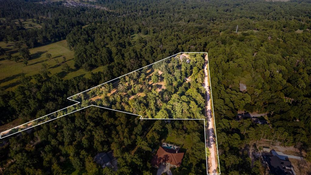 Photo of 6970 Longmire Road, Conroe, TX 77304 (MLS # 90983083)