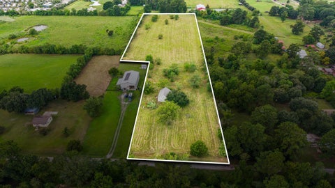 Photo of 10534 Hufsmith Road, Tomball, TX 77375 (MLS # 42399611)