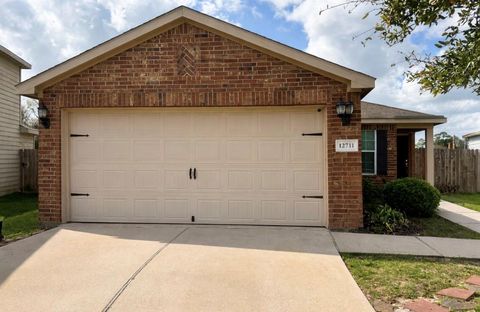 Photo of 12711 Mystic Water Lane, Houston, TX 77044 (MLS # 82485168)