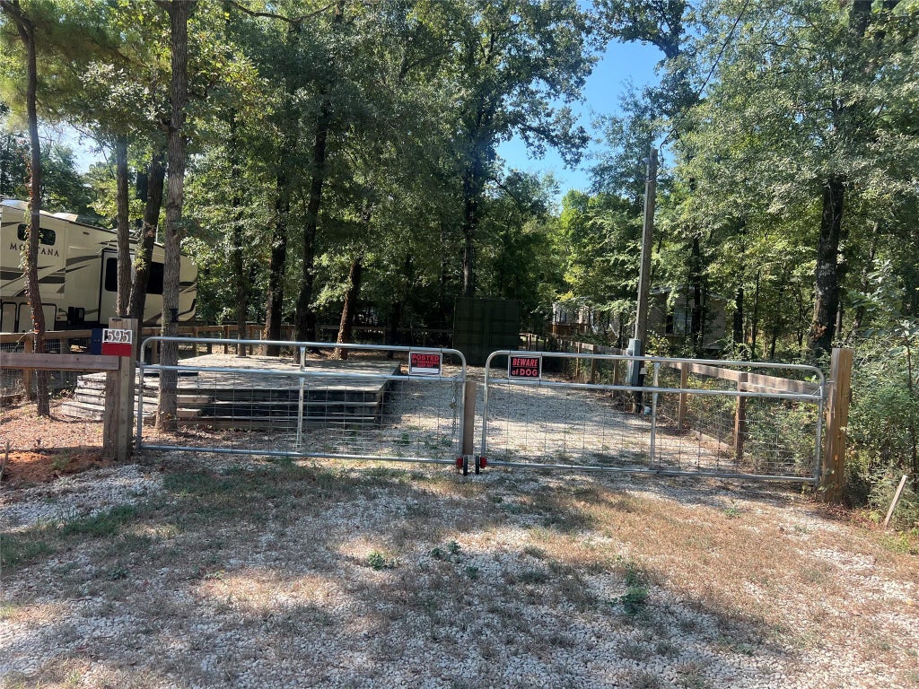 Photo of 595 Alta Vista Drive, Livingston, TX 77351 (MLS # 45291611)