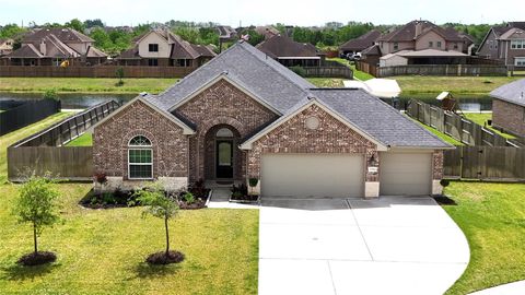 Photo of 11914 Champions Forest Drive, Mont Belvieu, TX 77535 (MLS # 11953632)