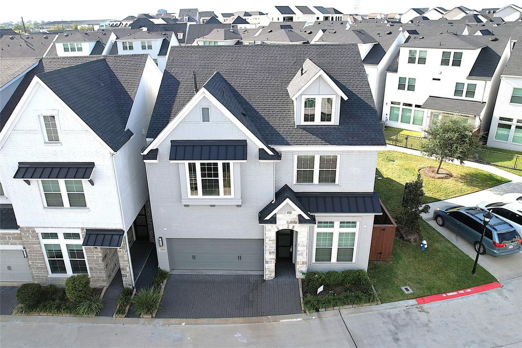 Photo of 3113 Somerset Levens Lane, Houston, TX 77055 (MLS # 88191649)