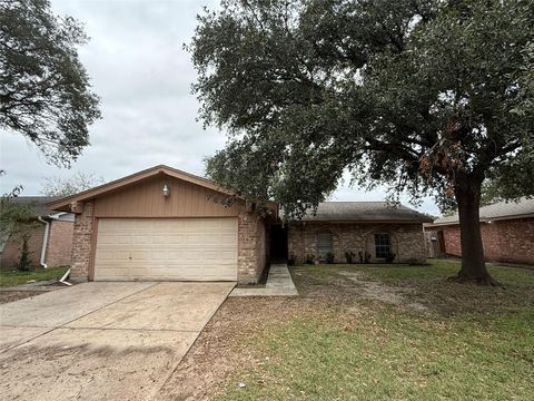 Photo of 7646 Winkle Wood Lane, Houston, TX 77086 (MLS # 46247166)