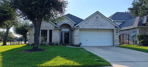 Photo of 10203 Ripple Lake Drive, Houston, TX 77065 (MLS # 22385751)