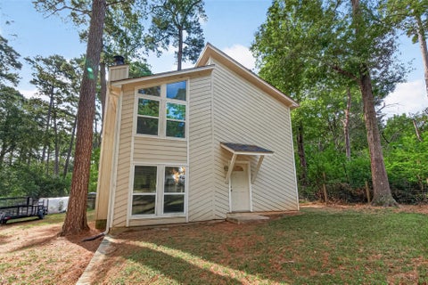 Photo of 12340 Rollingwood Loop, Conroe, TX 77303 (MLS # 28969823)