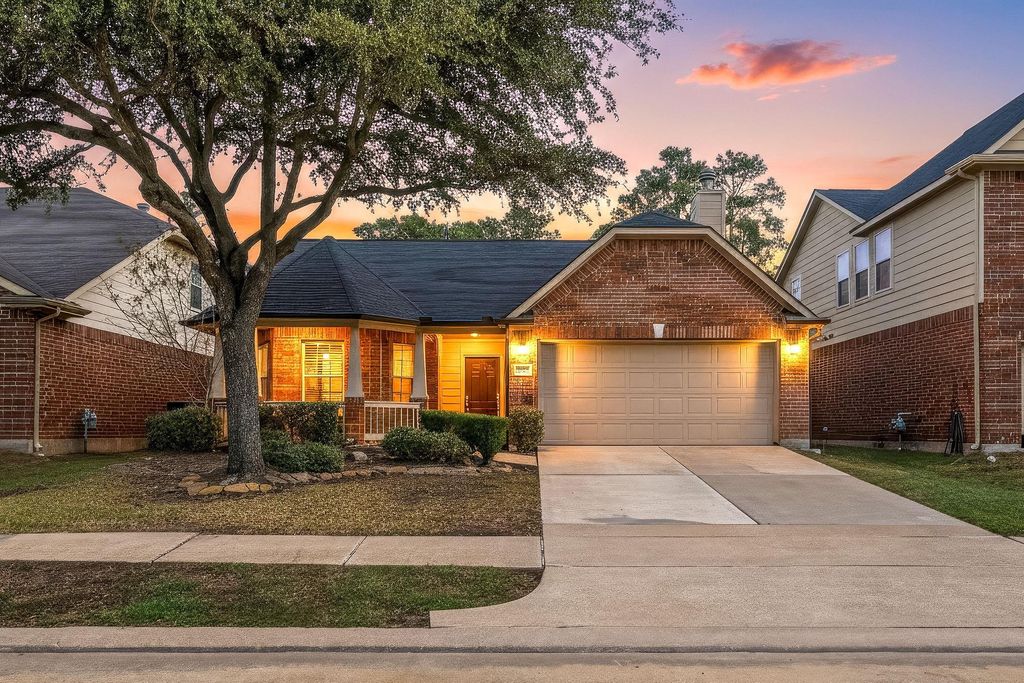 Photo of 12006 Champions Walk Lane, Houston, TX 77066 (MLS # 6659976)