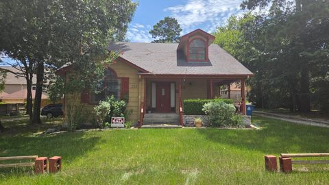 Photo of 250 Clear Water Street E, Montgomery, TX 77356 (MLS # 89694310)