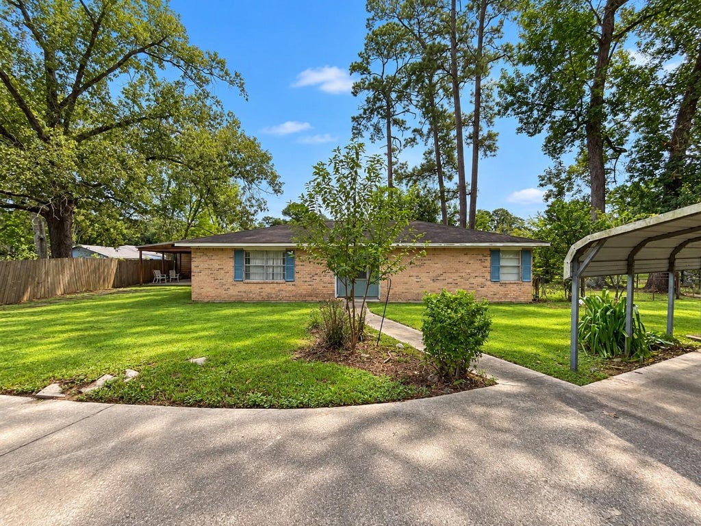 Photo of 25708 W Forest Circle Lane, Huffman, TX 77336 (MLS # 93946310)