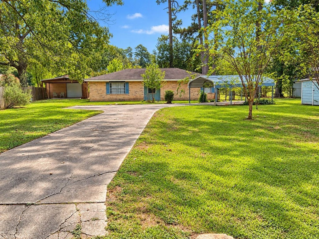 Photo of 25708 W Forest Circle Lane, Huffman, TX 77336 (MLS # 93946310)