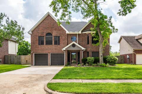 Photo of 1015 Highlands Woods Drive Dr, Highlands, TX 77562 (MLS # 54794584)