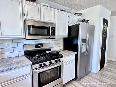 Photo of 4915 Stone Bridge Street, Baytown, TX 77521 (MLS # 31626381)