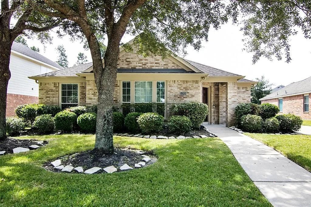 Photo of 12830 Cooper Breaks Drive, Humble, TX 77346 (MLS # 42635490)
