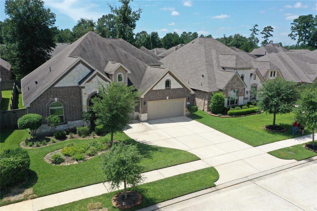 Photo of 23423 Tavola Rosa Drive, New Caney, TX 77357 (MLS # 73652878)