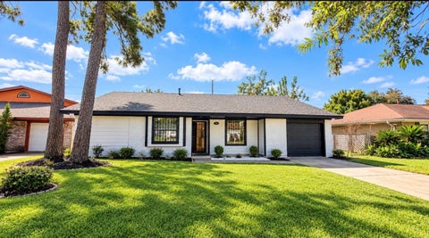 Photo of 8442 Rinn Street, Houston, TX 77078 (MLS # 73917419)