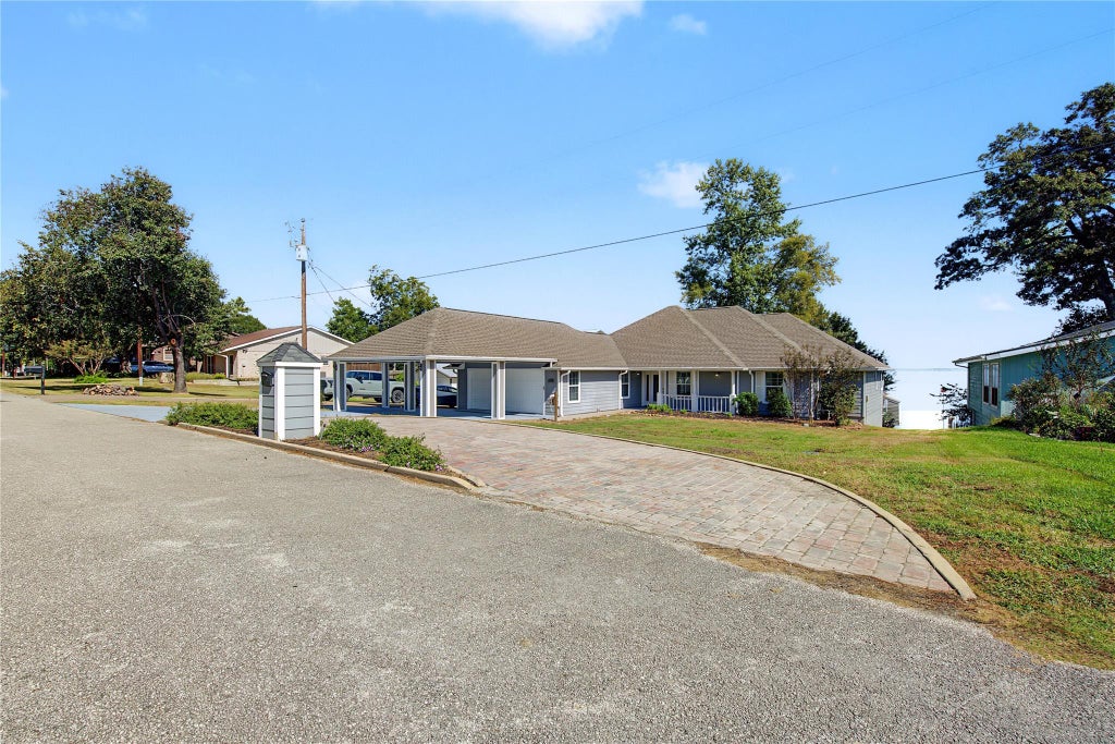 Photo of 341 Sam Houston Loop, Point Blank, TX 77364 (MLS # 23359497)