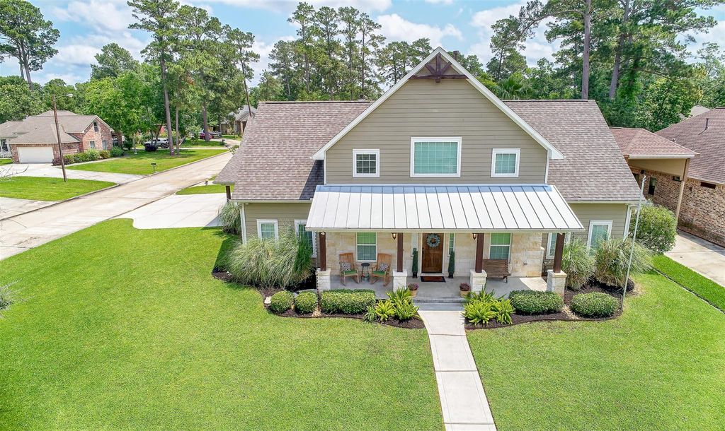Photo of 11939 Sagittarius Drive E, Willis, TX 77318 (MLS # 65520364)