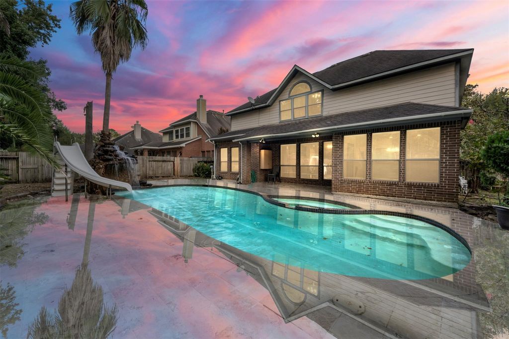 Photo of 4631 Tamarind Trail, Kingwood, TX 77345 (MLS # 19592403)