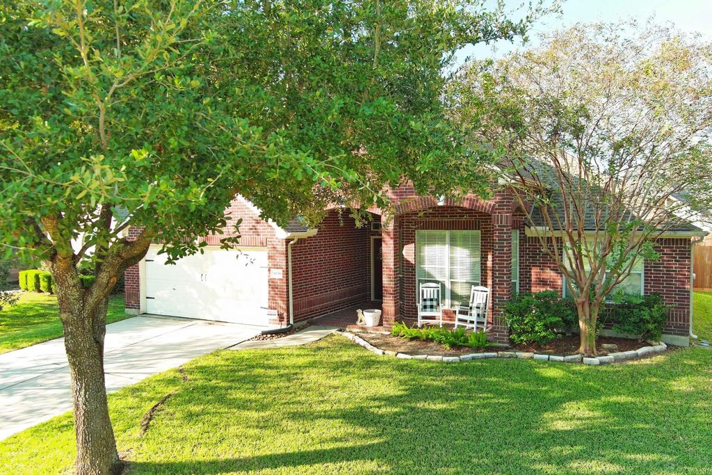 Photo of 9138 Running Eagle Falls, Tomball, TX 77375 (MLS # 22997932)