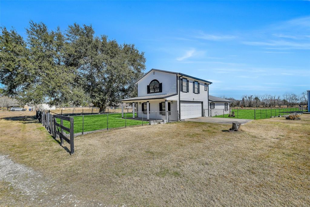 Photo of 1902 Fm 563, Anahuac, TX 77514 (MLS # 94897739)