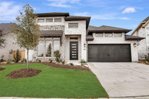 Photo of 7510 Snowfield Peak Ln Court, Katy, TX 77493 (MLS # 36409558)