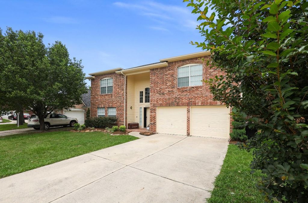 Photo of 18222 Winding Timbers Lane, Humble, TX 77346 (MLS # 3935045)