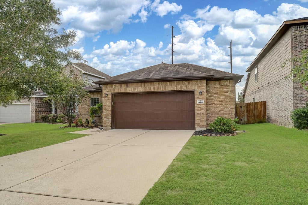 Photo of 4914 Seaside Sparrow Lane, Baytown, TX 77521 (MLS # 79593034)