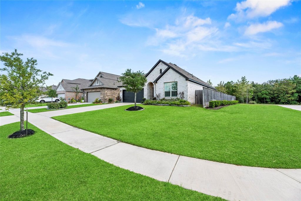 Photo of 19079 Pinewood Grove Trail, New Caney, TX 77357 (MLS # 72700700)