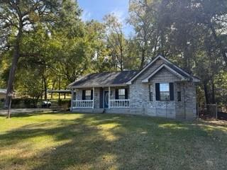 Photo of 101 Rustling Oaks Street, Coldspring, TX 77331 (MLS # 21225200)
